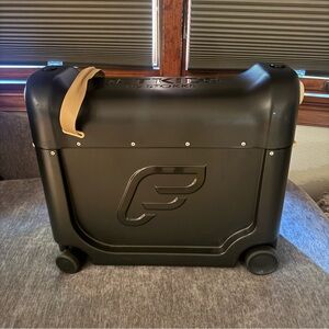 JetKids by Stokke Bedbox Black Ride-On Suitcase with Tan Strap
